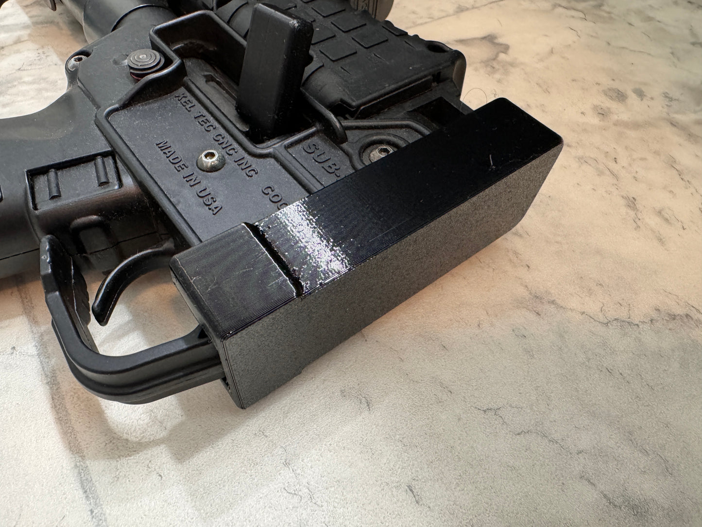 Folded Chamber Cover/Guard for Keltec Sub 2000